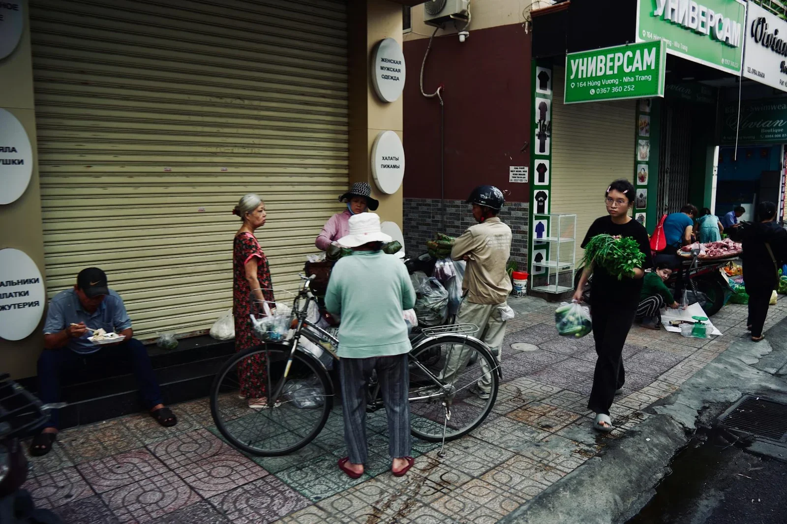 Vibrant street market in Nha Trang, Vietnam with people and  | Thiết kế nội thất 24