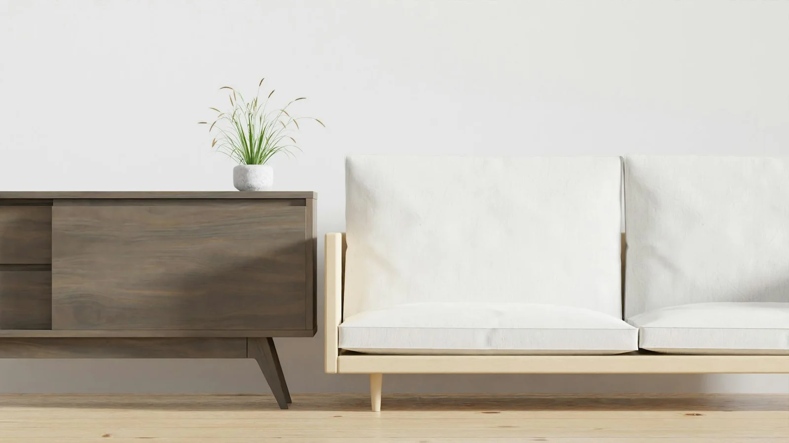 Phòng khách tối giản toát lên vẻ thanh lịch nhờ kệ gỗ trang nhã, chậu cây xanh và sofa màu be ấm cúng. | Thiết kế nội thất 24