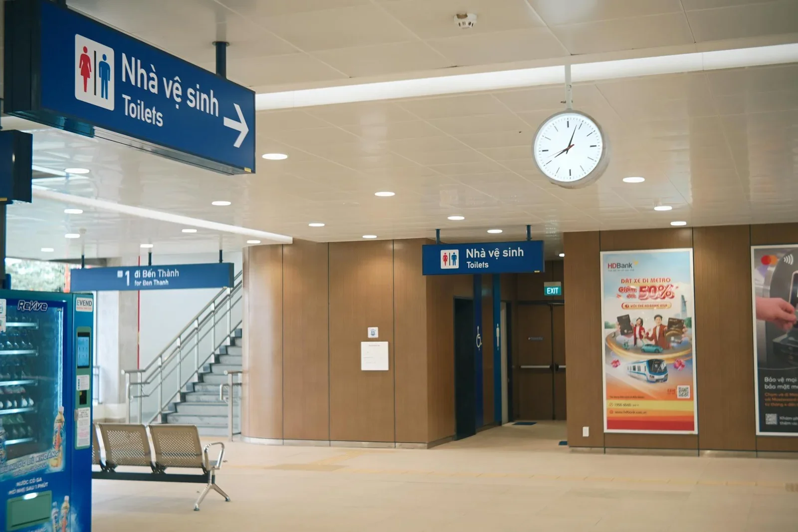 Spacious indoor train station with clear signage for toilets | Thiết kế nội thất 24
