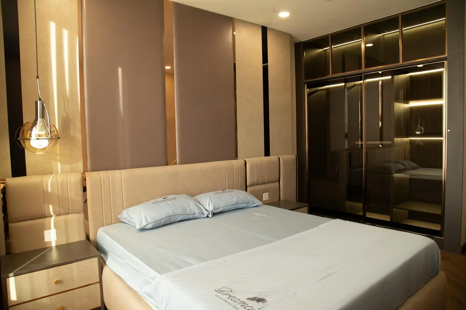 Luxurious hotel room featuring a modern bed design with soft | Thiết kế nội thất 24