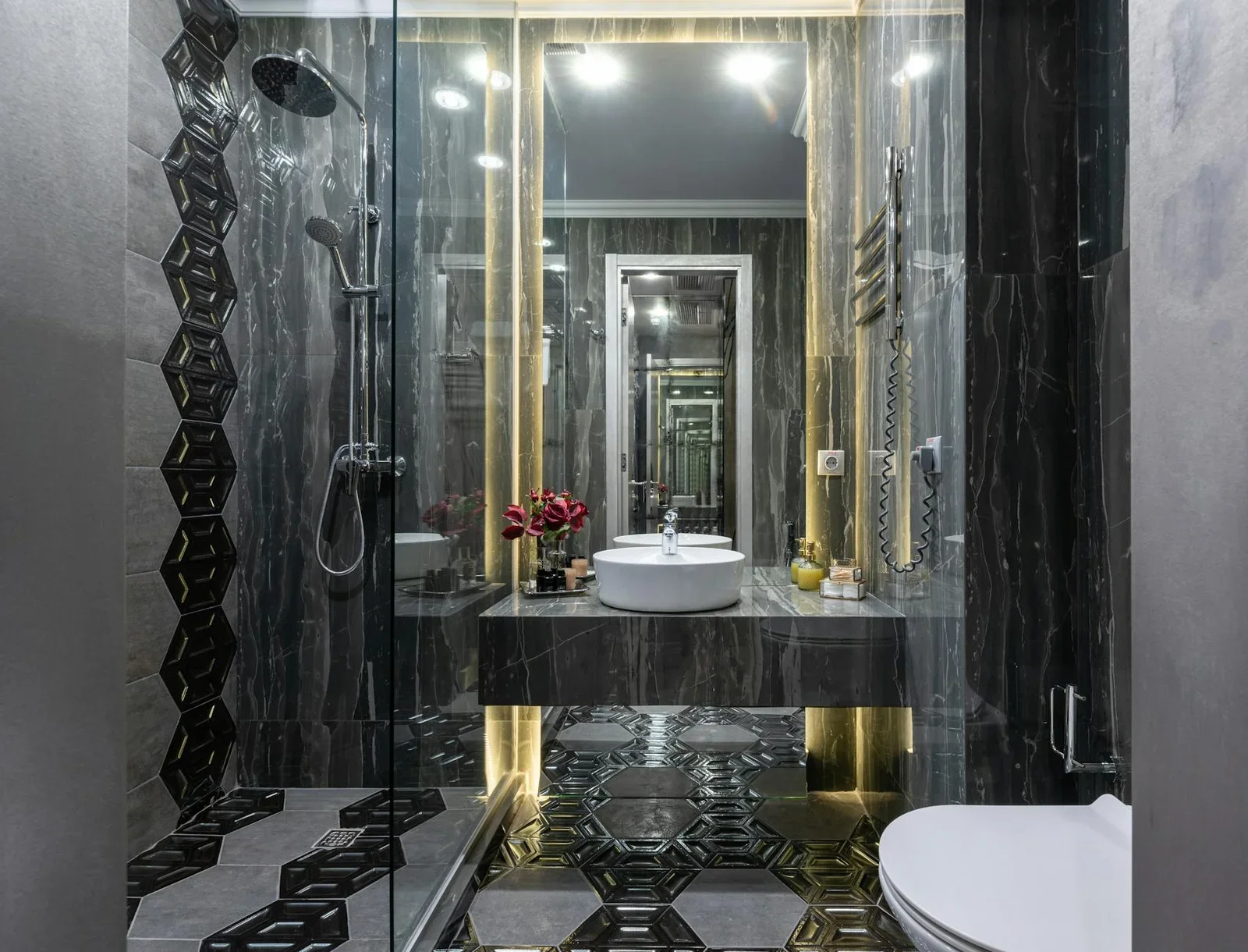 Interior of spacious contemporary bathroom with black tiled  | Thiết kế nội thất 24