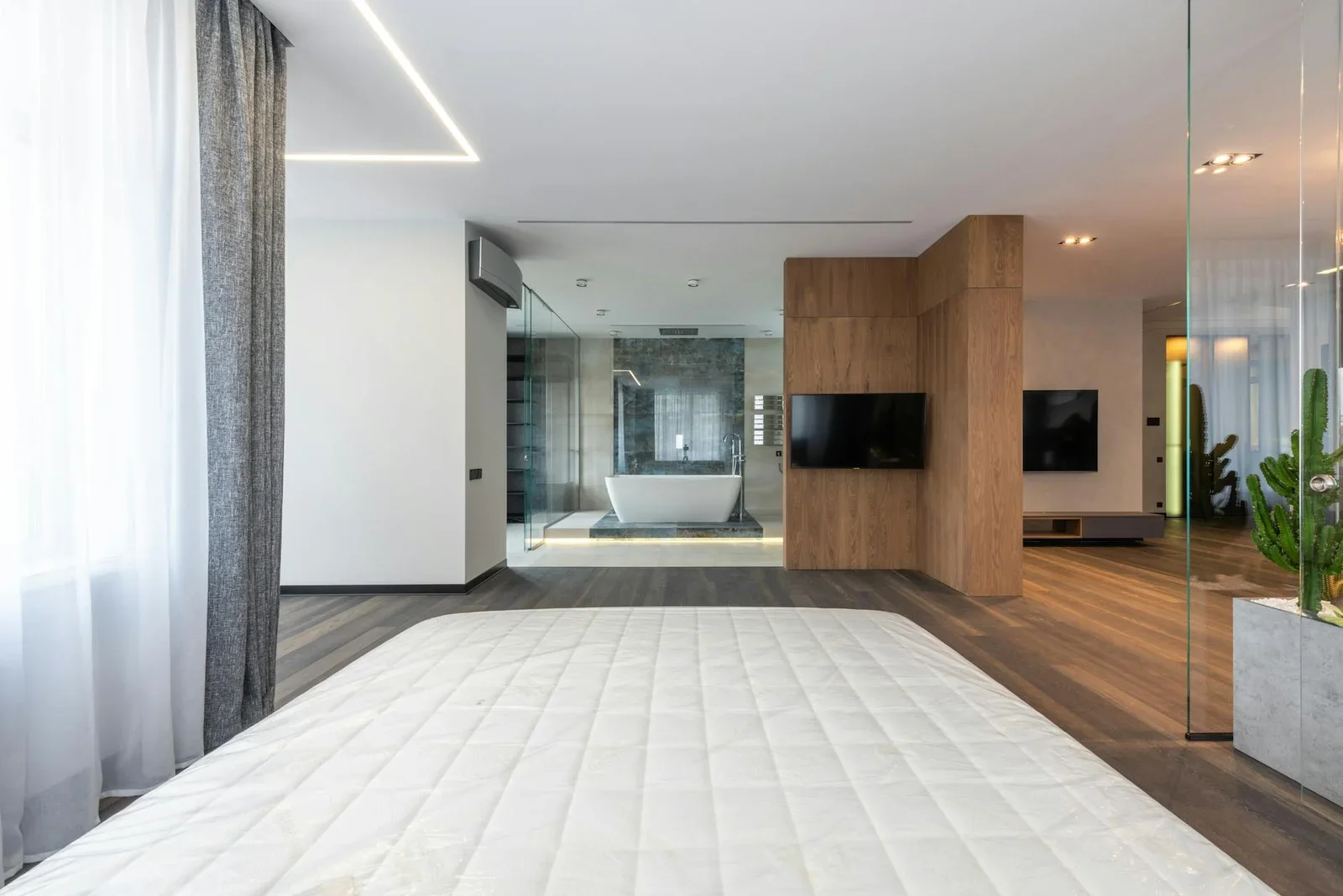 Interior of modern spacious apartment with wooden floor glas | Thiết kế nội thất 24