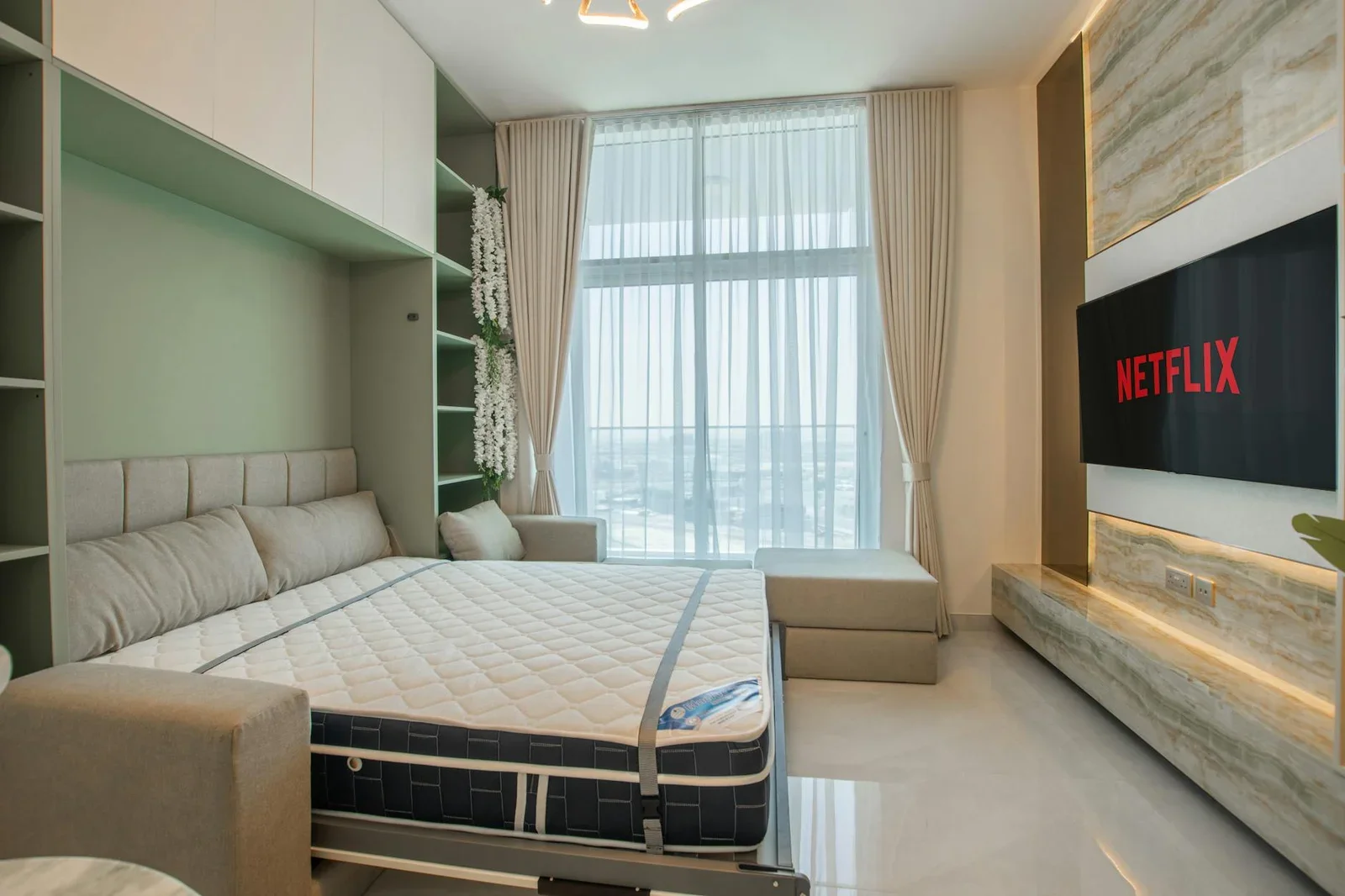Spacious and elegant bedroom featuring a cozy bed, large win | Thiết kế nội thất 24
