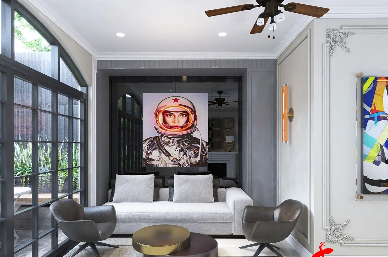 Phòng khách hiện đại với sofa trắng và tranh astronaut