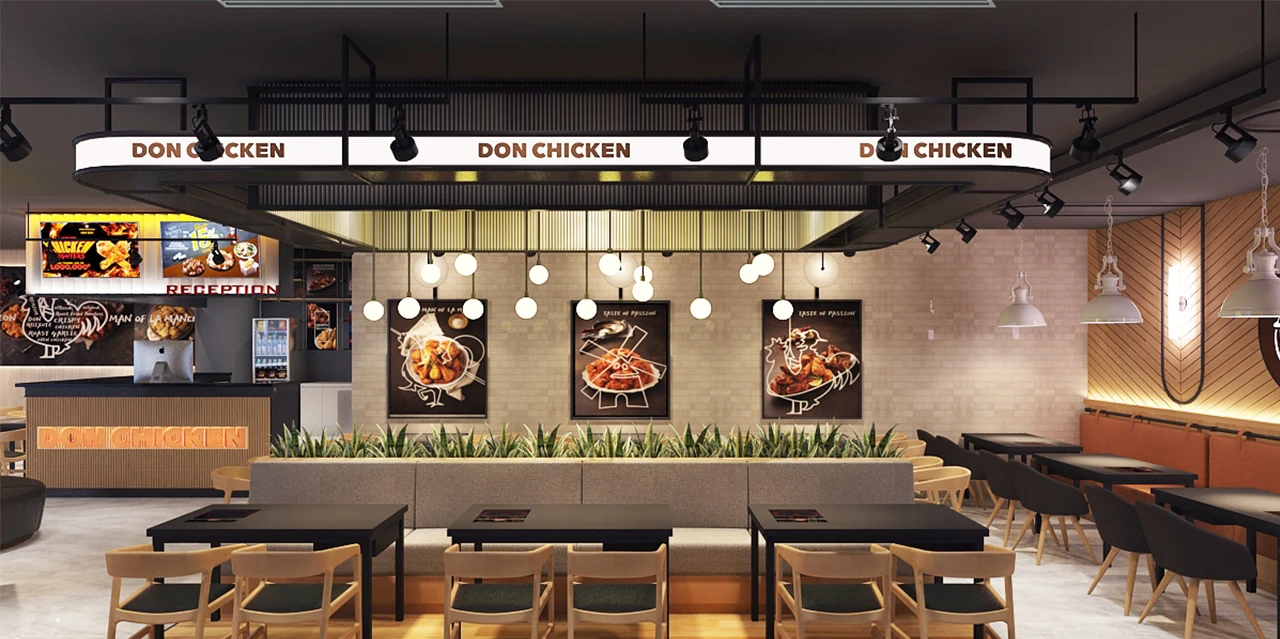 Don Chicken restaurant interior with modern decor and seating area.