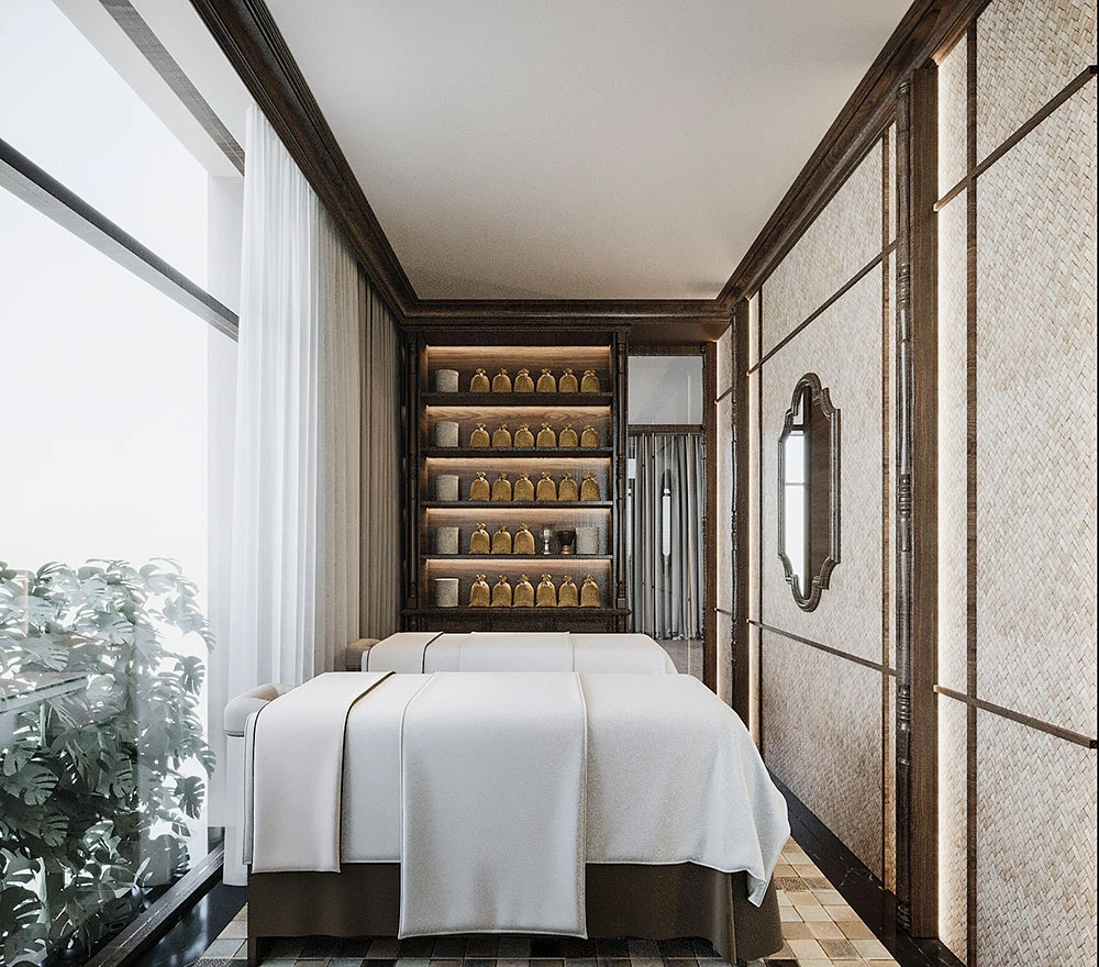 Phòng spa sang trọng với giường massage và kệ đựng túi thảo dược