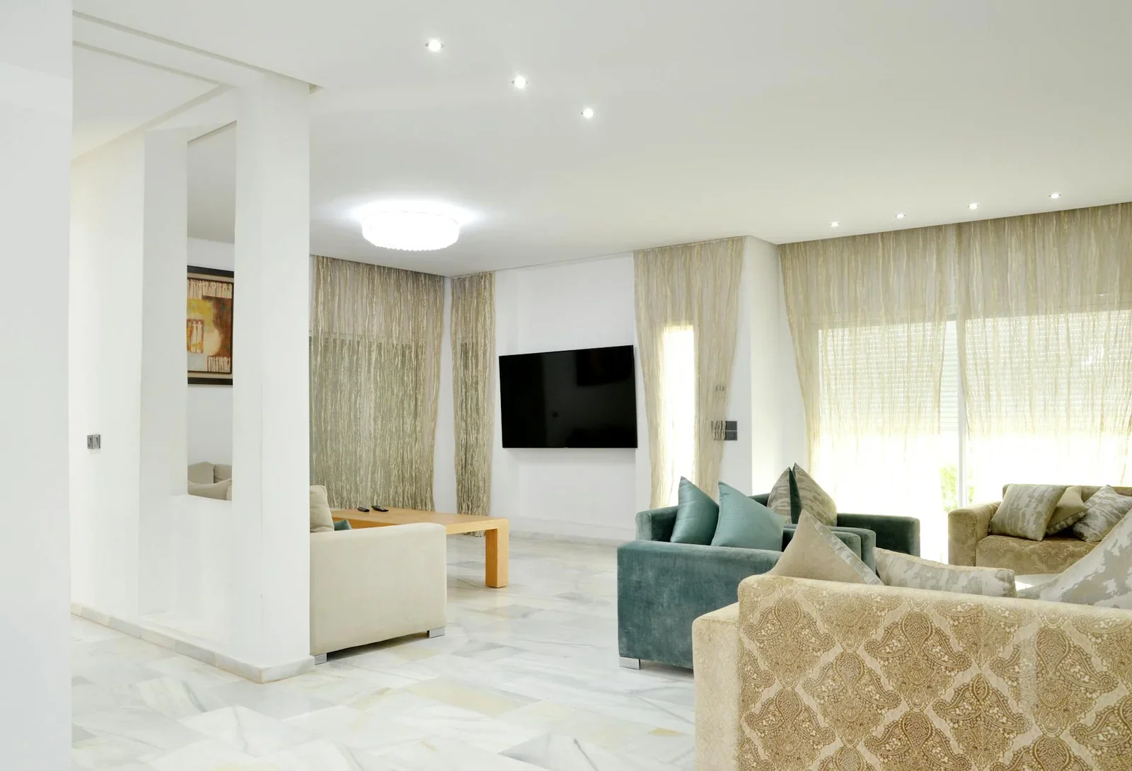 Spacious modern living room with elegant sofas and stylish d | Thiết kế nội thất 24