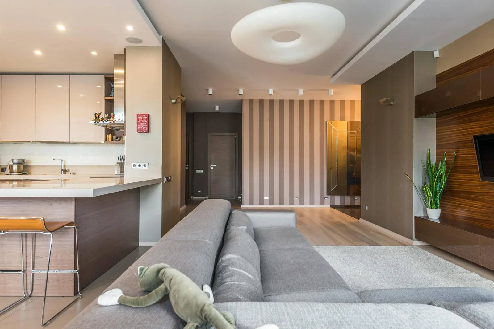 Spacious living room with a modern, minimalist design and op | Thiết kế nội thất 24