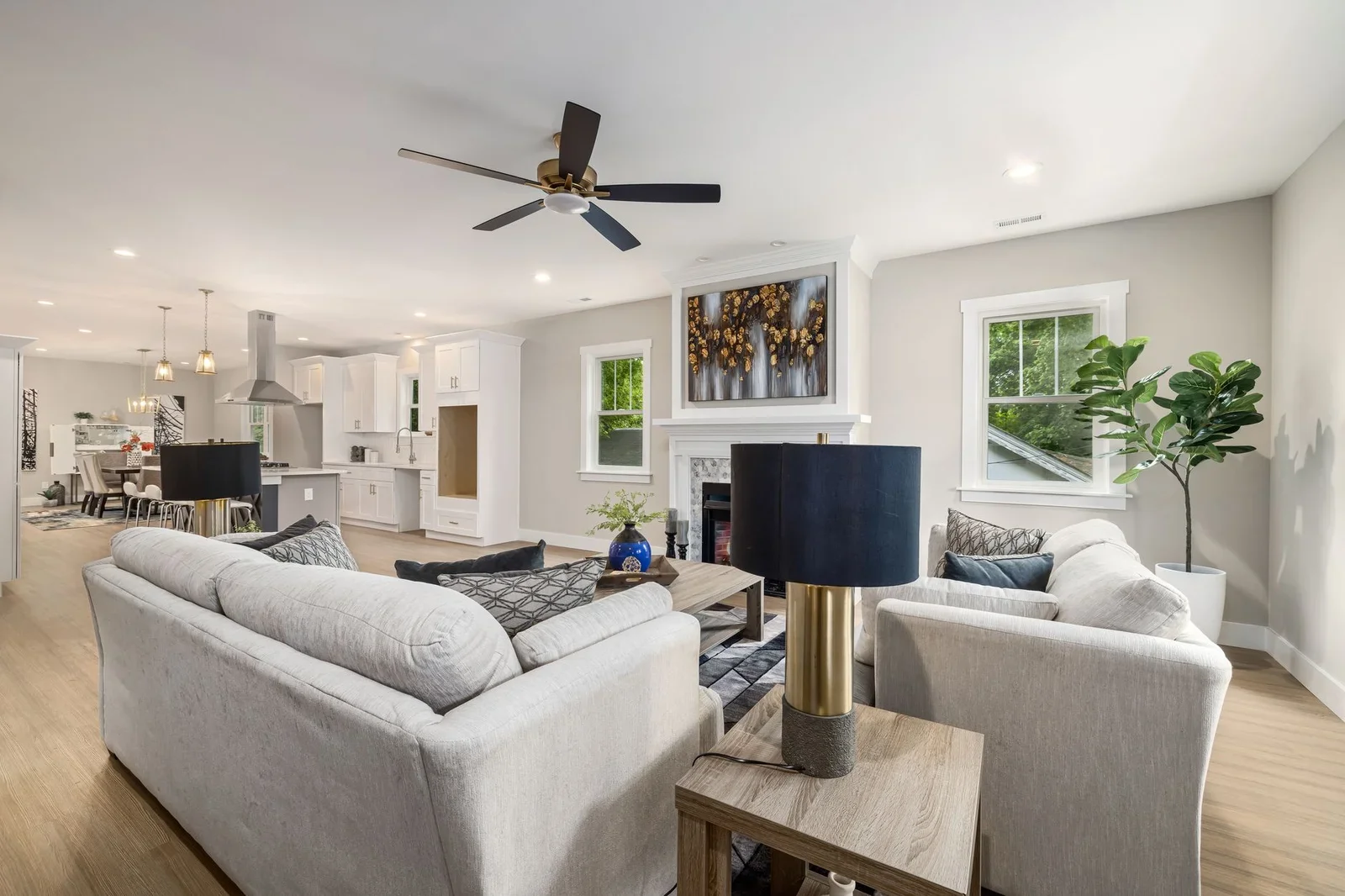 Stylish open-concept living room and kitchen featuring moder | Thiết kế nội thất 24