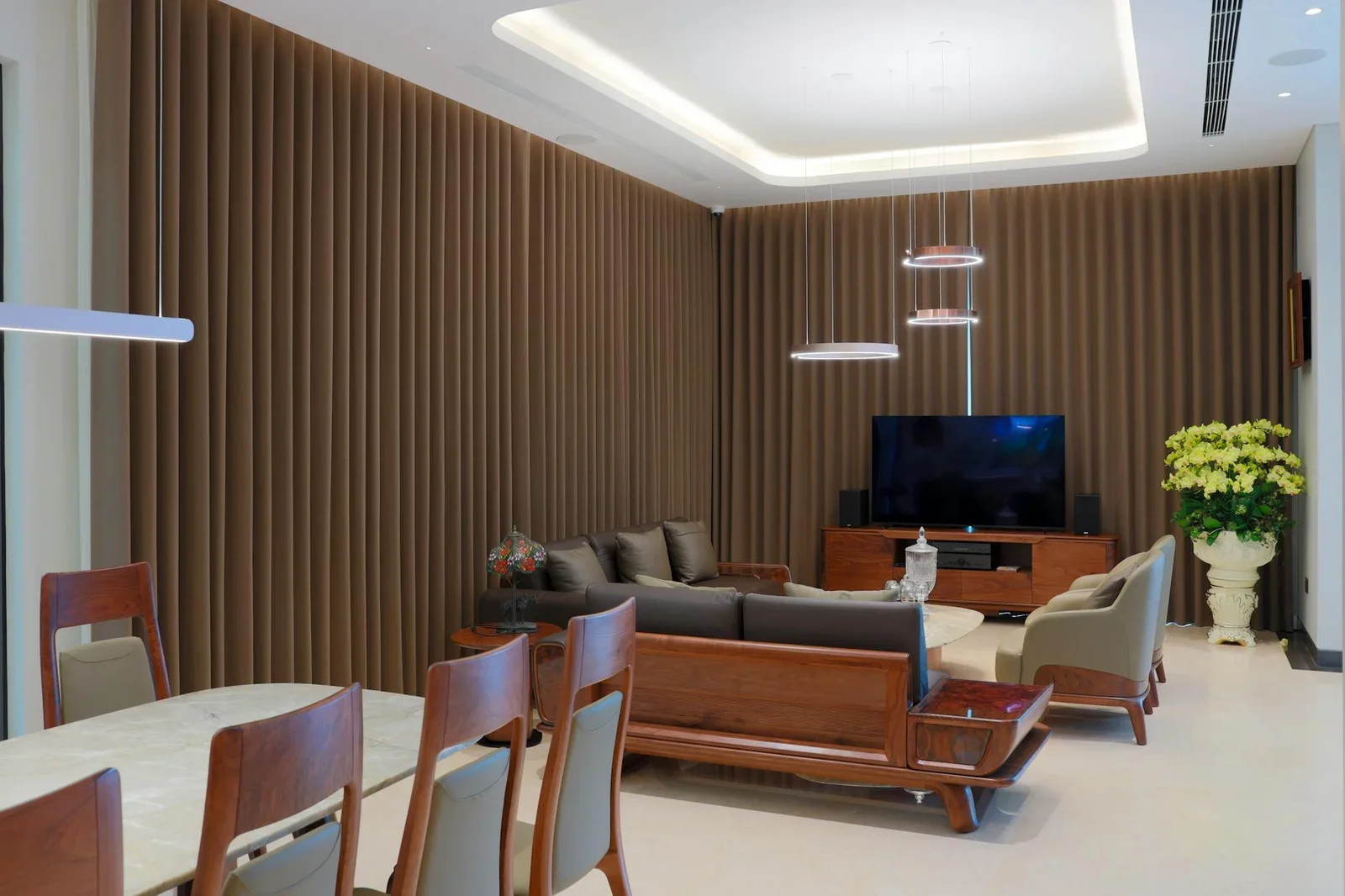 Stylish living room featuring modern furniture, soft lightin | Thiết kế nội thất 24