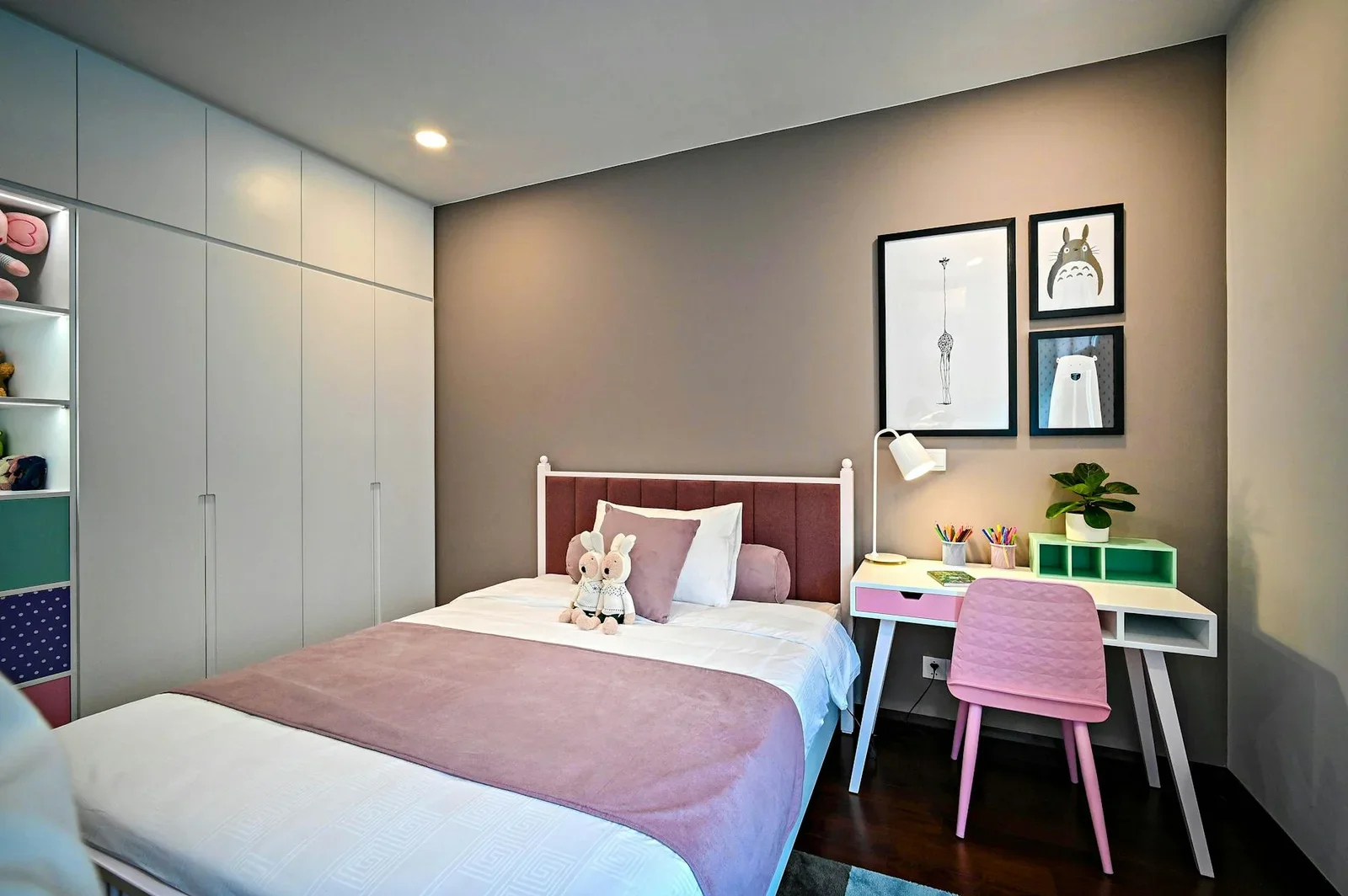 Chic kids' bedroom featuring a comfy bed, study desk, and pl | Thiết kế nội thất 24