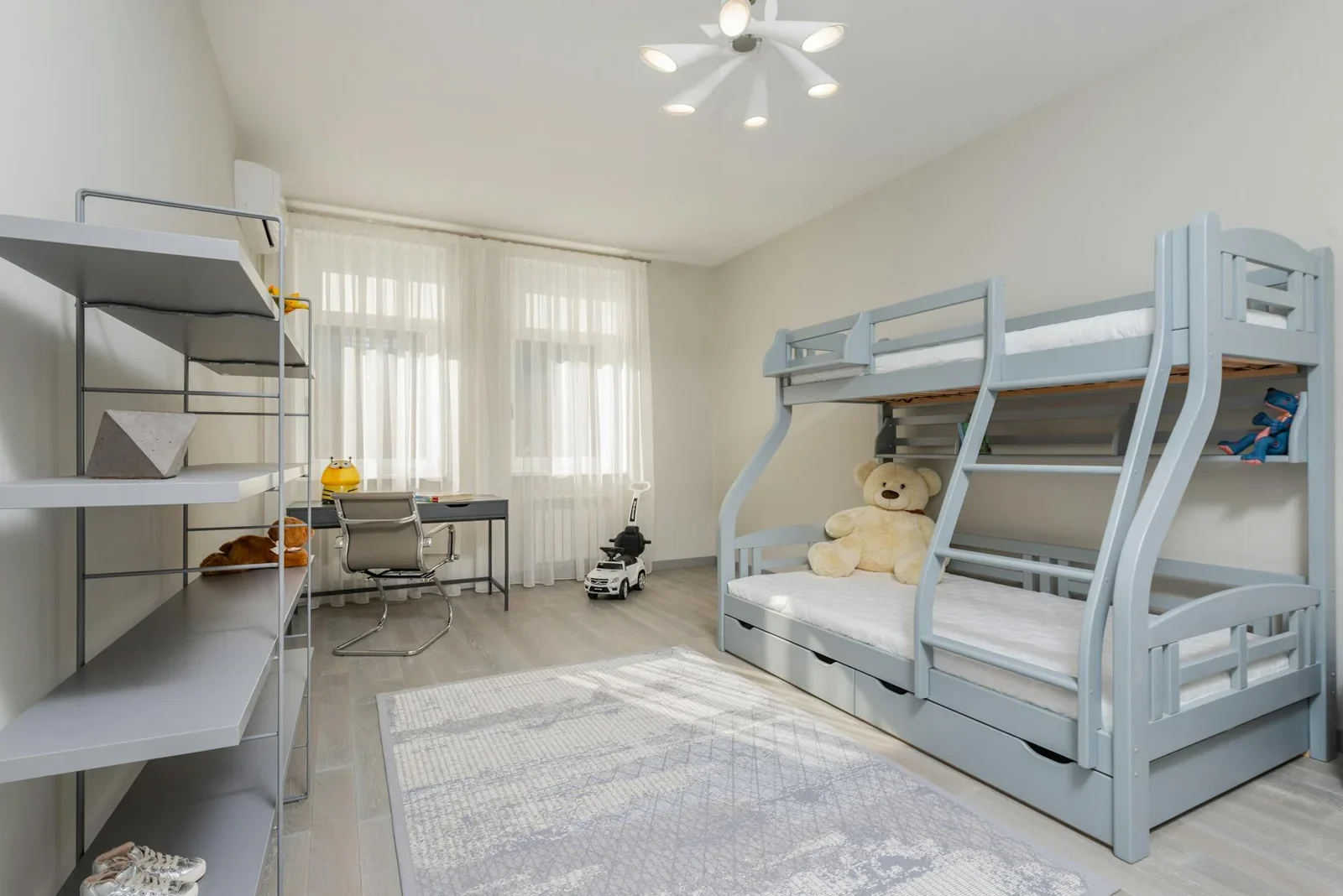 Interior of bedroom with desk and chair near window and gray | Thiết kế nội thất 24