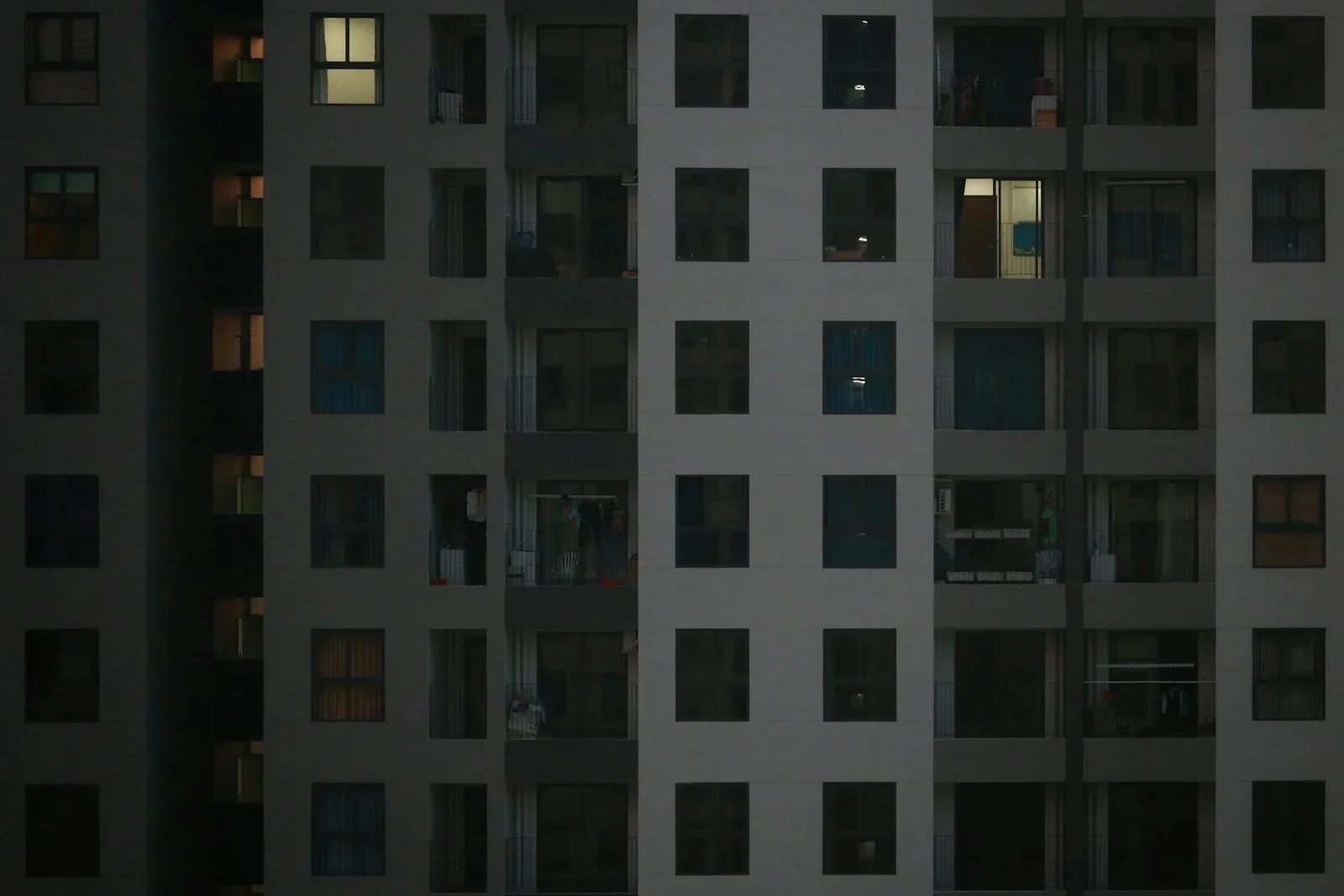 A detailed view of a modern apartment building facade with i | Thiết kế nội thất 24