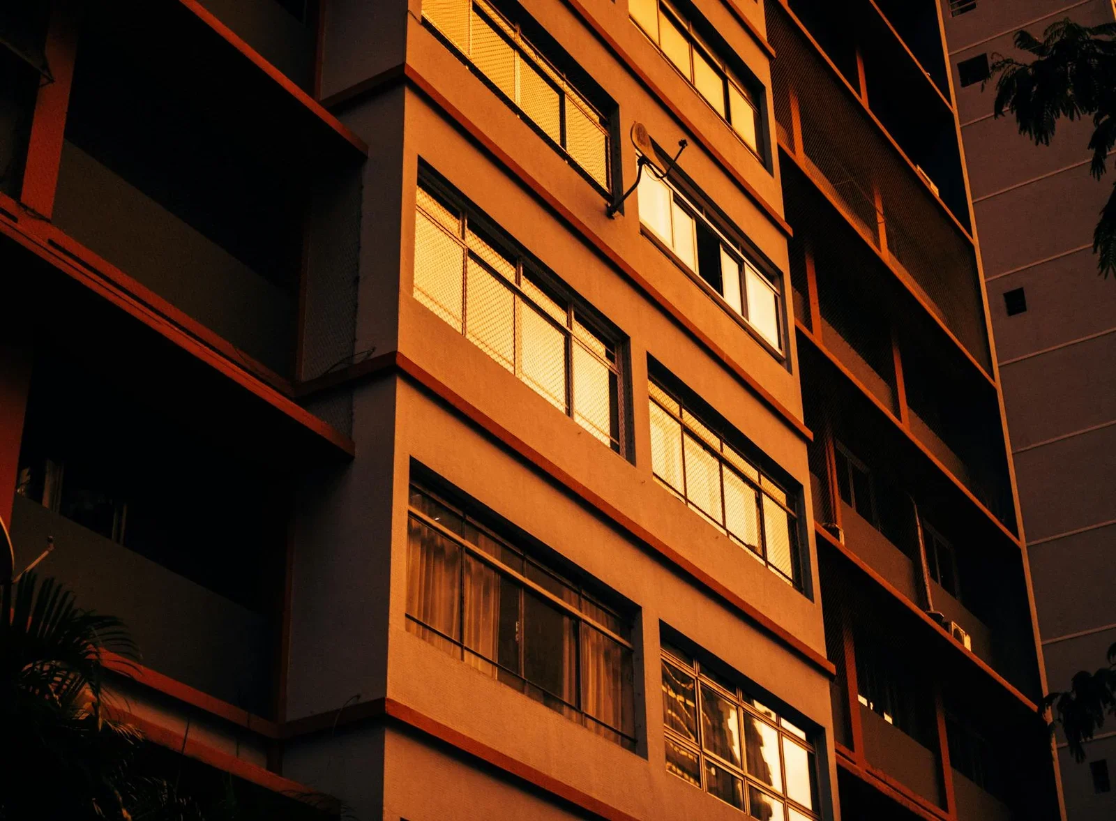Close-up of a residential building facade illuminated by war | Thiết kế nội thất 24