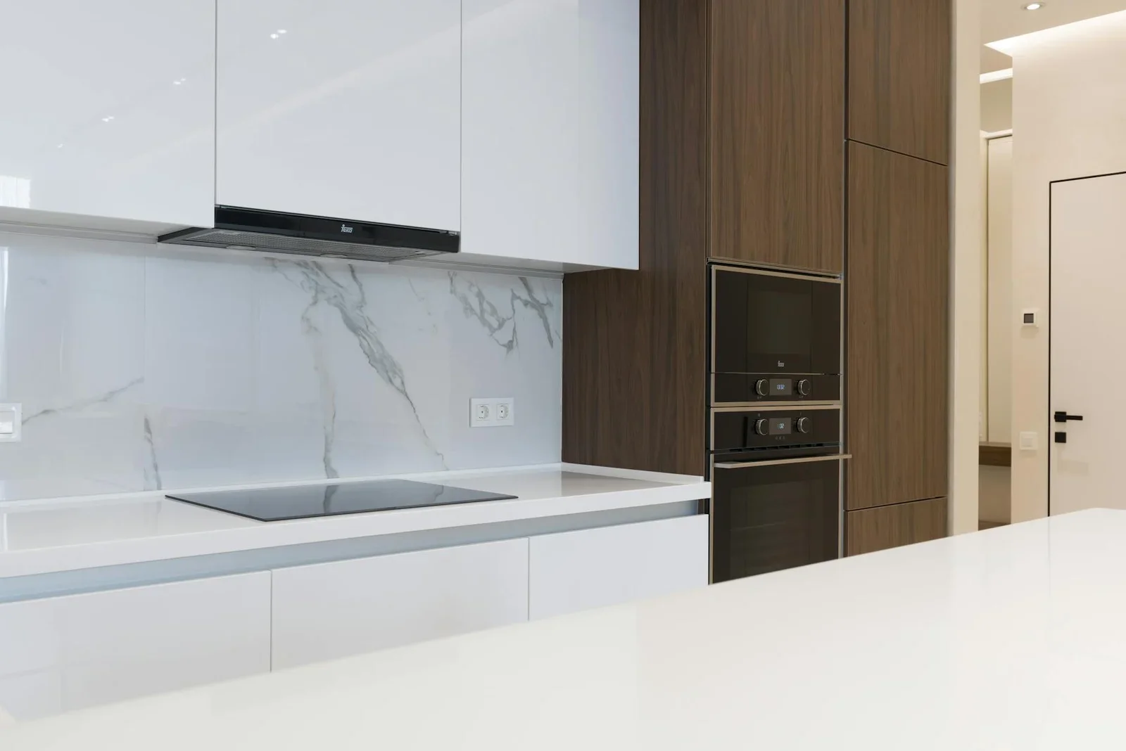 Built in ovens in wooden cupboard placed in contemporary kit | Thiết kế nội thất 24
