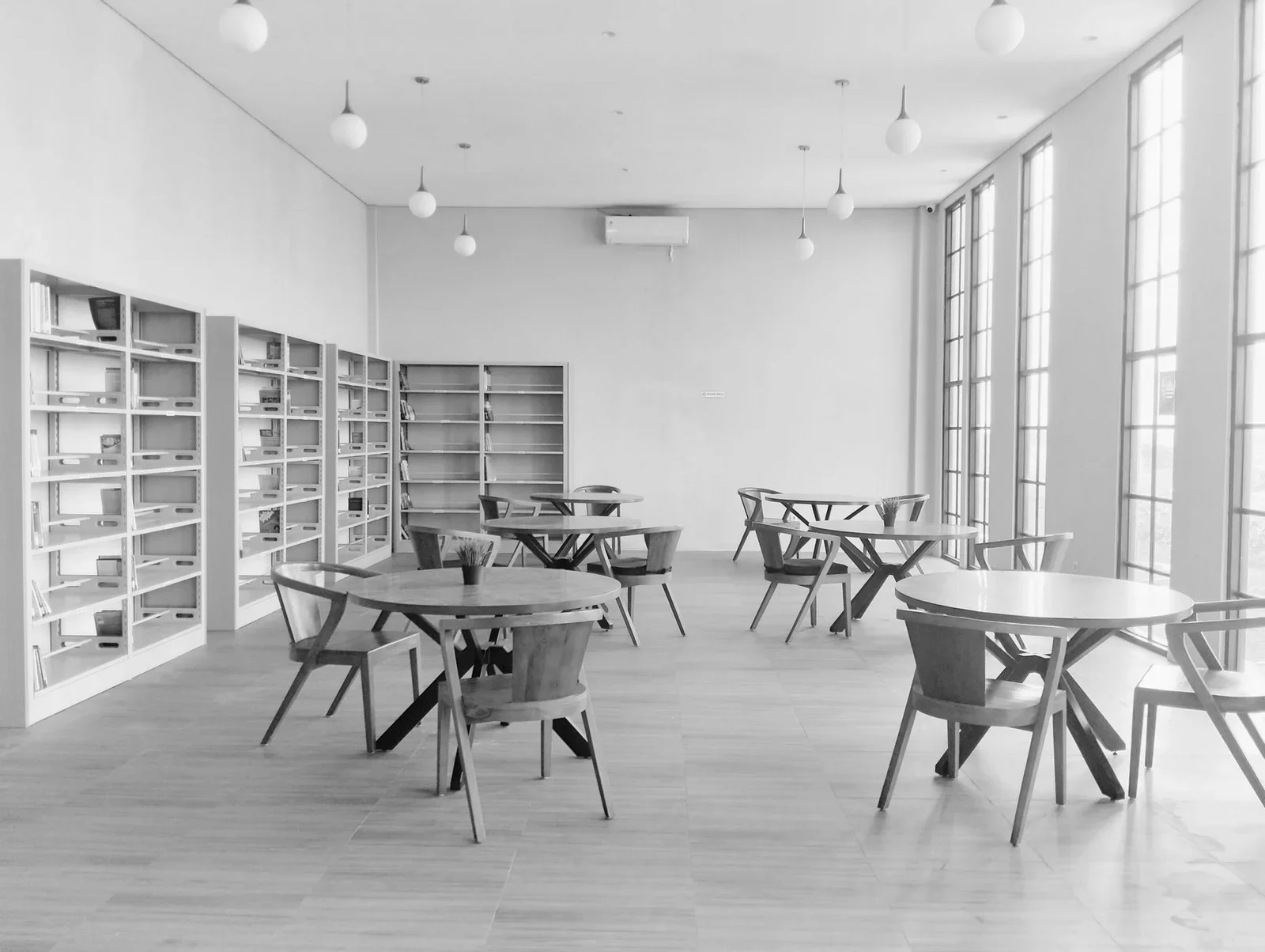 Black and white minimalist library interior with shelves, ta | Thiết kế nội thất 24