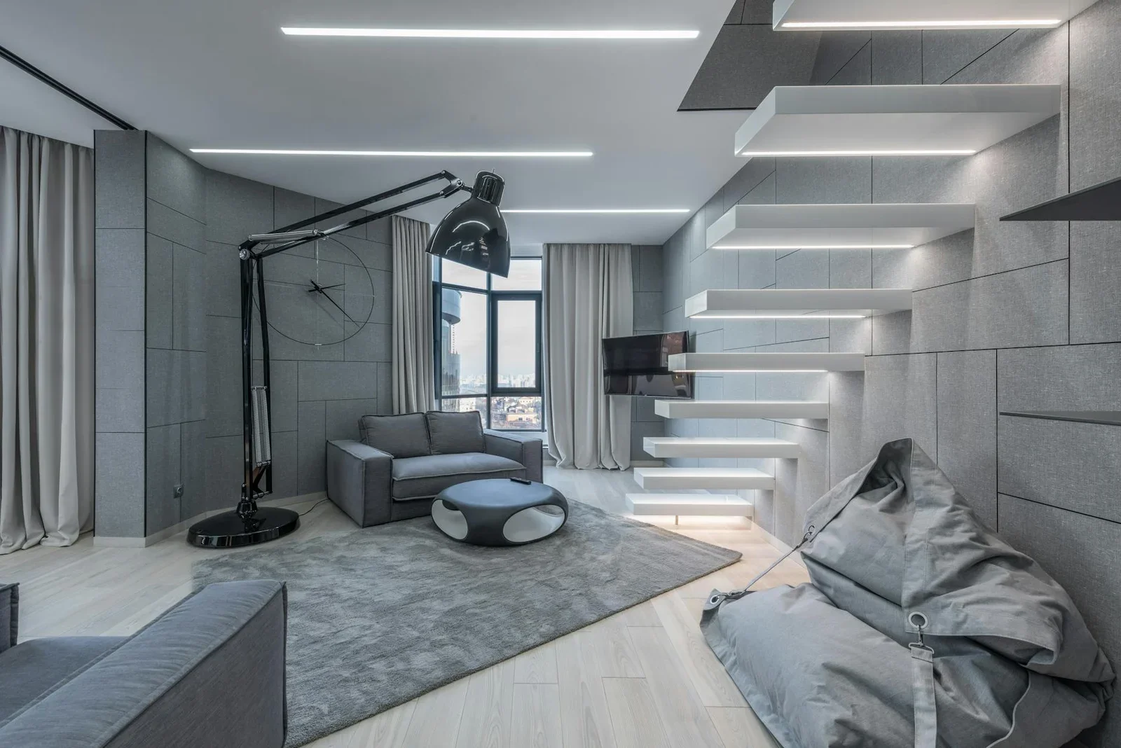 Căn phòng duplex đương đại bài trí nội thất tinh tế theo lối tối giản, đón trọn ánh sáng ban ngày tạo không gian thoáng đãng. | Thiết kế nội thất 24